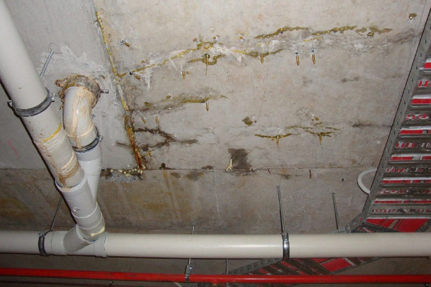 chemical injectiong being used on cracked concrete