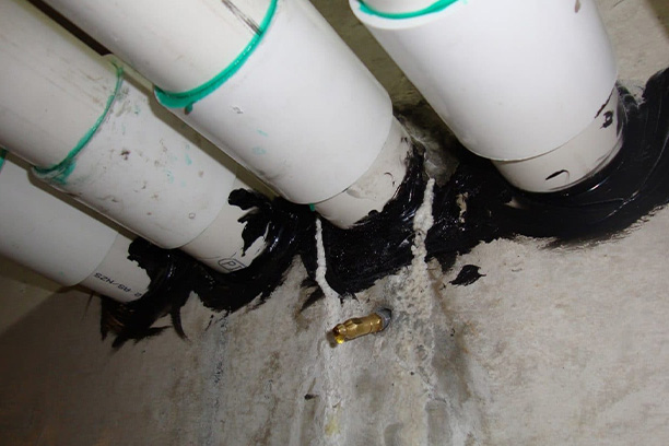 Leaks Around Pipes being fixed by chemical injection